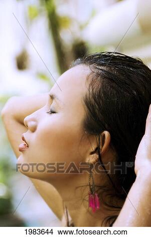Thailand, Bangkok, Thai Woman In Outdoor Shower. View Large Photo Image Picture - Thailand, Bangkok, Thai Woman In Outdoor Shower.. Fotosearch