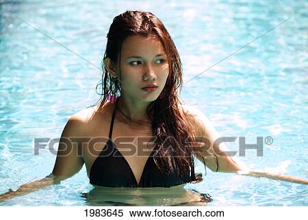 Thailand, Bangkok, Thai Woman In Swimming Pool. View Large Photo Image Stock Photography - Thailand, Bangkok, Thai Woman In Swimming Pool.. Fotosearch