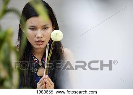 Stock Photography - Thailand, Bangkok, Thai Woman Praying.. Fotosearch