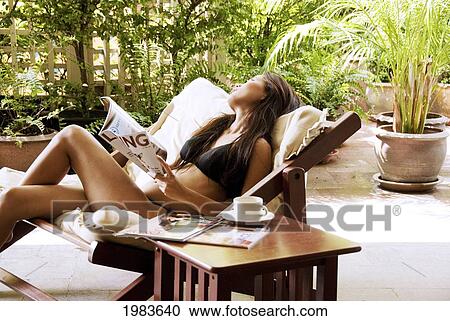 Thailand, Bangkok, Thai Woman Relaxing In Spa Like Setting. View Large Photo Image Stock Image - Thailand, Bangkok, Thai Woman Relaxing In Spa Like Setting.. Fotosearch