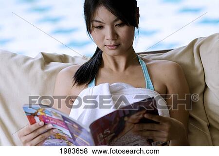 Stock Photo - Thailand, Bangkok, Thai Woman Relaxing In Spa Like Setting.. Fotosearch