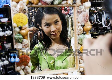 Stock Photo - Thailand, Bangkok, Thai Woman Shopping.. Fotosearch