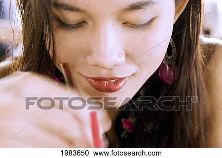 Thailand, Bangkok, Thai Woman Sipping A Drink. View Large Photo Image Stock Image - Thailand, Bangkok, Thai Woman Sipping A Drink.. Fotosearch