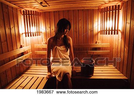 Stock Photo - Thailand, Bangkok, Thai Woman Sitting In A Sauna.. Fotosearch