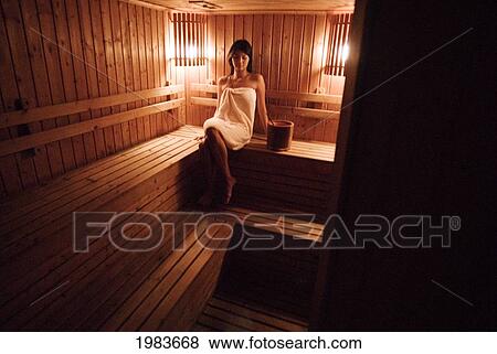 Thailand, Bangkok, Thai Woman Sitting In A Sauna. View Large Photo Image Stock Photo - Thailand, Bangkok, Thai Woman Sitting In A Sauna.. Fotosearch