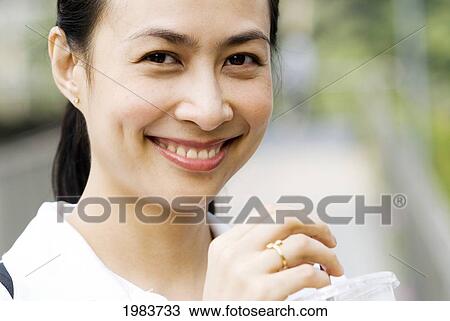 Thailand, Bangkok, Thai Woman Smiling. View Large Photo Image Stock Image - Thailand, Bangkok, Thai Woman Smiling.. Fotosearch