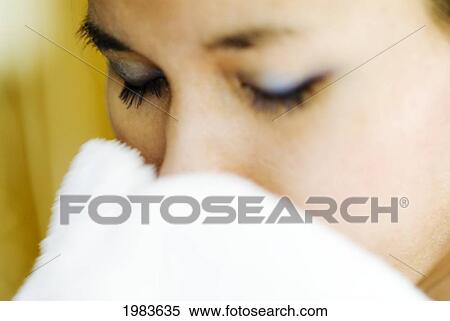 Stock Photography - Thailand, Bangkok, Thai Woman Toweling Face Dry.. Fotosearch