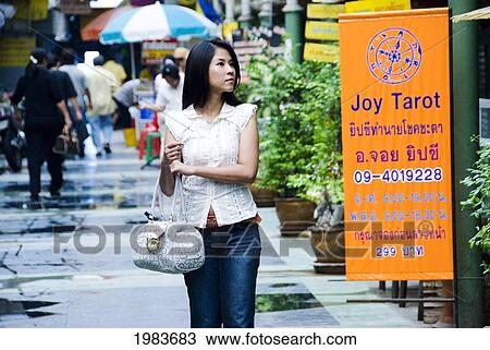 Thailand, Bangkok, Thai Woman Walking Down Street, Shopping. View Large Photo Image Stock Image - Thailand, Bangkok, Thai Woman Walking Down Street, Shopping.. Fotosearch