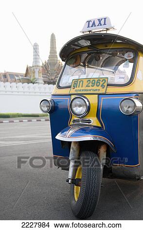 Thailand, Bangkok, Tuk Tuk Parked In Front Of Grand Palace And Wat Phra Kaew Temple. View Large Photo Image Picture - Thailand, Bangkok, Tuk Tuk Parked In Front Of Grand Palace And Wat Phra Kaew Temple.. Fotosearch