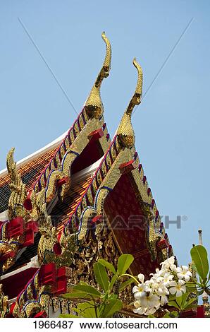 Stock Photo - Thailand, Bangkok, Wat Pho Buddhist Temple, Cho Fa Finials On Viharn.. Fotosearch