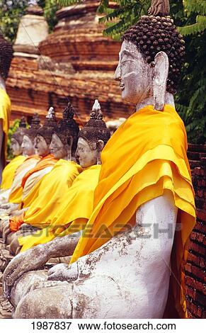 Stock Photo - Thailand, Bodhisattva statues in Wat Yai Chai Monghon; Ayuthaya. Fotosearch