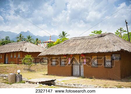 Thailand, Chiang Mai, Buildings with arched doorway and covered windows in Chinese village; Shandicun View Large Photo Image Stock Photo - Thailand, Chiang Mai, Buildings with arched doorway and covered windows in Chinese village; Shandicun. Fotosearch