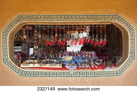Stock Photo - Thailand, Chiang Mai, Display of souvenirs on window sill; Shandicun. Fotosearch