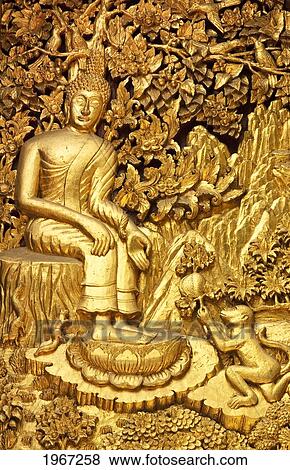 Thailand, Chiang Mai, Golden Wall Art At Wat Mahawan Buddhist Temple. View Large Photo Image Stock Photo - Thailand, Chiang Mai, Golden Wall Art At Wat Mahawan Buddhist Temple.. Fotosearch