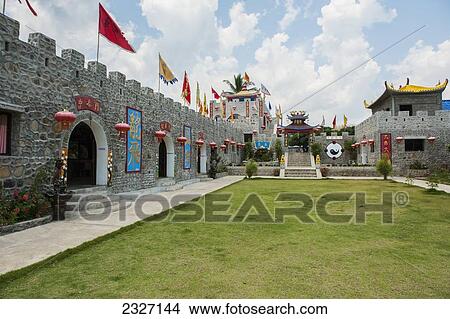 Thailand, Flags and lanterns line outside of building in Chinese village; Shandicun View Large Photo Image Picture - Thailand, Flags and lanterns line outside of building in Chinese village; Shandicun. Fotosearch