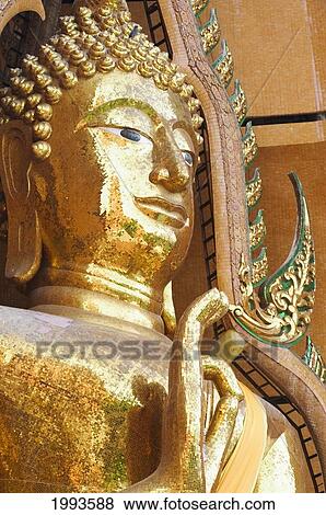 Stock Photo - Thailand, Kanchanaburi, Large Buddha Statue At Wat Tham Sua. Fotosearch