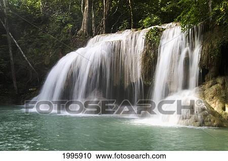 Thailand, Kanchanaburi Province, Erawan National Park, One Of The Falls From The 7-Tiered Erawan Waterfall View Large Photo Image Stock Image - Thailand, Kanchanaburi Province, Erawan National Park, One Of The Falls From The 7-Tiered Erawan Waterfall. Fotosearch