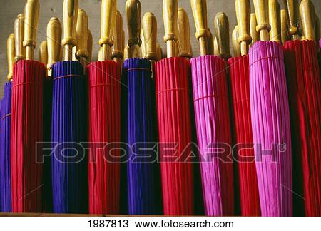 Thailand, Line of colorful closed umbrellas; Baw Sang View Large Photo Image Stock Image - Thailand, Line of colorful closed umbrellas; Baw Sang. Fotosearch