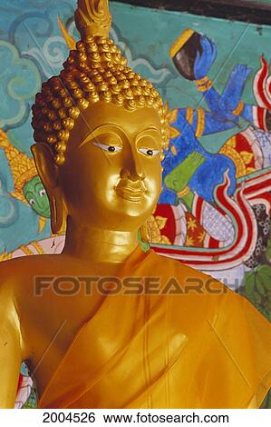 Thailand, Lop Buri, Close-Up Of Buddha Statue With Saffron Robe Colorful Painted Background View Large Photo Image Stock Photograph - Thailand, Lop Buri, Close-Up Of Buddha Statue With Saffron Robe Colorful Painted Background. Fotosearch