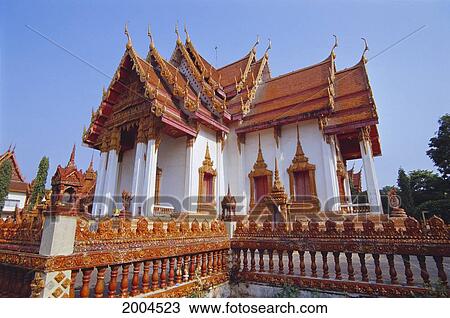 Thailand, Lop Buri, Exterior Of Temple Architecture With Fence Detail Surrounding, Pale Blue Sky View Large Photo Image Stock Image - Thailand, Lop Buri, Exterior Of Temple Architecture With Fence Detail Surrounding, Pale Blue Sky. Fotosearch