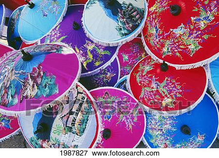 Stock Photo - Thailand, Nakhon Pathom, Detail Of Many Colorful Handpainted Umbrellas Overlapping. Fotosearch
