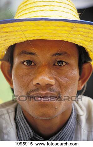 Stock Photography - Thailand, Portrait Of Native Man Wearing Straw Hat No Model Release. Fotosearch