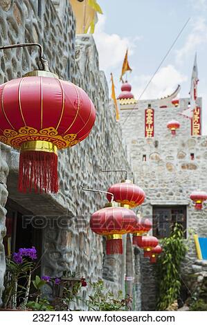 Thailand, Red and gold lanterns hanging in row outside buildings; Shandicun View Large Photo Image Stock Image - Thailand, Red and gold lanterns hanging in row outside buildings; Shandicun. Fotosearch