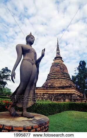 Stock Photo - Thailand, Sukhothai Historical Park, Wat Sa Si, Walking Buddha.. Fotosearch