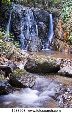 Thailand, tributary falls; Mae Hong Son Province, View of Pha Sua Waterfall View Large Photo Image Stock Photo - Thailand, tributary falls; Mae Hong Son Province, View of Pha Sua Waterfall. Fotosearch