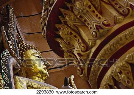 Stock Image - Thailand, Wat Tham Seu or Big Buddha Temple; Kanchanaburi. Fotosearch