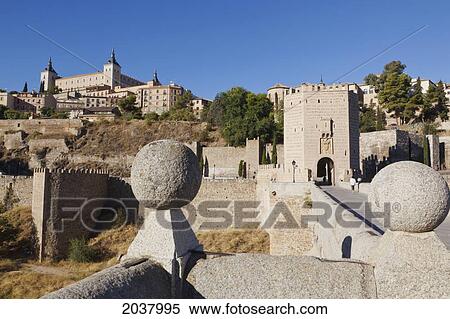 The Alcantara Bridge And The Alcazar Behind; Toledo Toledo Province Castilla-La Mancha Spain View Large Photo Image Stock Photography - The Alcantara Bridge And The Alcazar Behind; Toledo Toledo Province Castilla-La Mancha Spain. Fotosearch