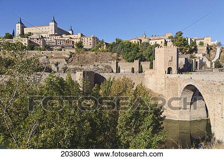 The Alcantara Bridge Over The Tagrus River And The Alcazar Behind; Toledo Toledo Province Castilla-La Mancha Spain View Large Photo Image Stock Image - The Alcantara Bridge Over The Tagrus River And The Alcazar Behind; Toledo Toledo Province Castilla-La Mancha Spain. Fotosearch