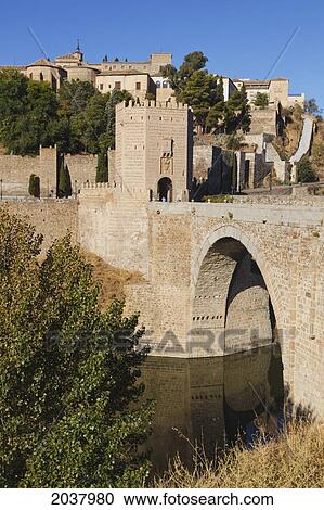 The Alcantara Bridge Over The Tagus River; Toledo Toledo Province Castilla-La Mancha Spain View Large Photo Image Stock Image - The Alcantara Bridge Over The Tagus River; Toledo Toledo Province Castilla-La Mancha Spain. Fotosearch