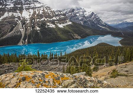 The aquamarine waters of Peyto Lake, Banff National Park; Alberta, Canada View Large Photo Image Stock Photography - The aquamarine waters of Peyto Lake, Banff National Park; Alberta, Canada. Fotosearch