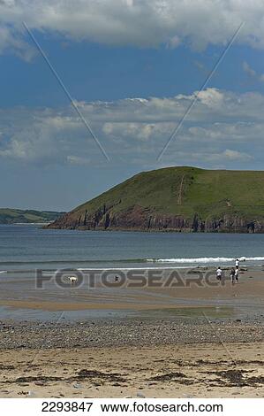 The beach at Manorbier. Once described as 'the pleasantest place in Wales'. Pembrokeshire. Wales. Cymru. UK. United Kingdom. View Large Photo Image Stock Photo - The beach at Manorbier. Once described as 'the pleasantest place in Wales'. Pembrokeshire. Wales. Cymru. UK. United Kingdom.. Fotosearch
