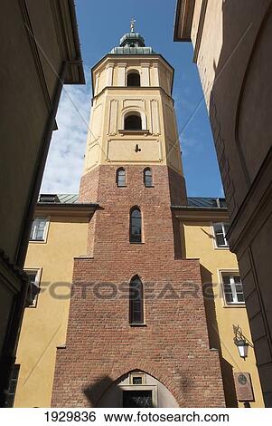 The bell tower of the Church of St Martin on Piwna Street, Old Town district, Poland View Large Photo Image Stock Photograph - The bell tower of the Church of St Martin on Piwna Street, Old Town district, Poland. Fotosearch