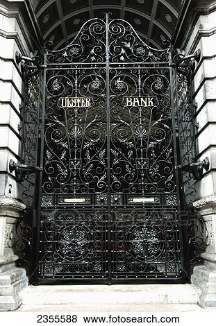 Stock Photo - The Black Metal Gate To A Bank; Dublin, Ireland. Fotosearch