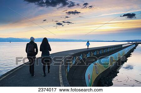 Stock Photo - The Breakwater Is A Large Cement Dam At Ogden Point; Victoria, Vancouver Island, British Columbia, Canada. Fotosearch