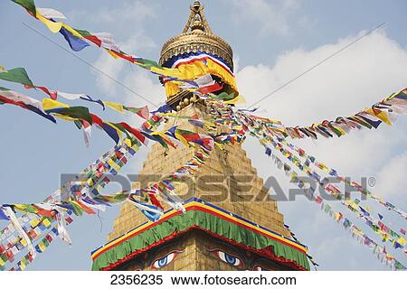 The Buddhist stupa of Boudhanath dominates the skyline and is one of the largest in the world; Boudhanath, Nepal View Large Photo Image Stock Photography - The Buddhist stupa of Boudhanath dominates the skyline and is one of the largest in the world; Boudhanath, Nepal. Fotosearch