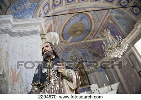 Stock Image - The Chapelle Saint Roch. Located in the hamlet of Pietronacce. Austere on the outside, the interior is a small jewel of a style termed 'rural baroque' with its stenciled walls and arched wooden ceiling. Cap Corse. Corsica. France. Fotosearch