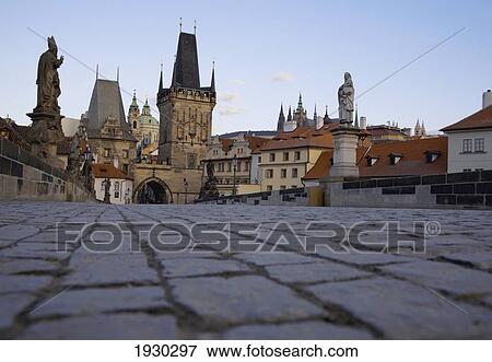 Stock Photo - The Charles Bridge at dawn, Prague, Czech Republic, Europe. Fotosearch