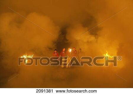 The 'clergy' On The 'clergy Stand Surrounded By Thick Smoke, Barcombe Bonfire Night, East Sussex View Large Photo Image Stock Image - The 'clergy' On The 'clergy Stand Surrounded By Thick Smoke, Barcombe Bonfire Night, East Sussex. Fotosearch