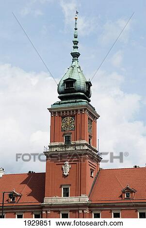 The clock tower on the Royal Castle (Zamek Krolewski) in Zamkowy Square (Plac Zamkowy), Old Town district, Warsaw, Poland View Large Photo Image Stock Image - The clock tower on the Royal Castle (Zamek Krolewski) in Zamkowy Square (Plac Zamkowy), Old Town district, Warsaw, Poland. Fotosearch
