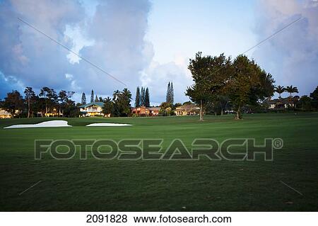 Stock Photo - The Coastal Makai Golf Course At Sunset; Princeville, Kauai, Hawaii. Fotosearch