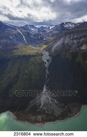 The Colors Of Autumn And The Aquamarine Waters Of Primrose Lake Seen From The Air; Yukon Canada View Large Photo Image Picture - The Colors Of Autumn And The Aquamarine Waters Of Primrose Lake Seen From The Air; Yukon Canada. Fotosearch