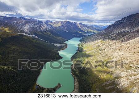The Colors Of Autumn And The Aquamarine Waters Of Primrose Lake Seen From The Air; Yukon Canada View Large Photo Image Stock Image - The Colors Of Autumn And The Aquamarine Waters Of Primrose Lake Seen From The Air; Yukon Canada. Fotosearch