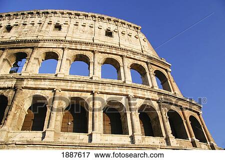 Stock Photo - The Colosseum And Blue Sky, Close Up. Fotosearch