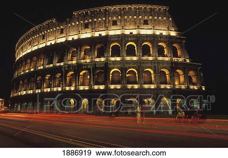 The Colosseum Lit Up At Night With Light Trails Infront View Large Photo Image Stock Photo - The Colosseum Lit Up At Night With Light Trails Infront. Fotosearch