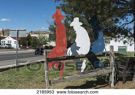 Stock Image - The Cowboy Silhouette Sculpture. Bob Hext's Tres Amigos, Alpine, Texas, Usa. Fotosearch