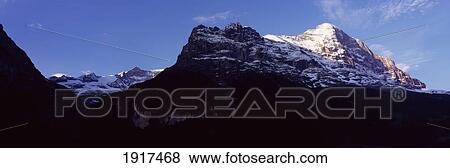 Stock Photo - The Eiger In The Bernese Alps At Dawn. Fotosearch